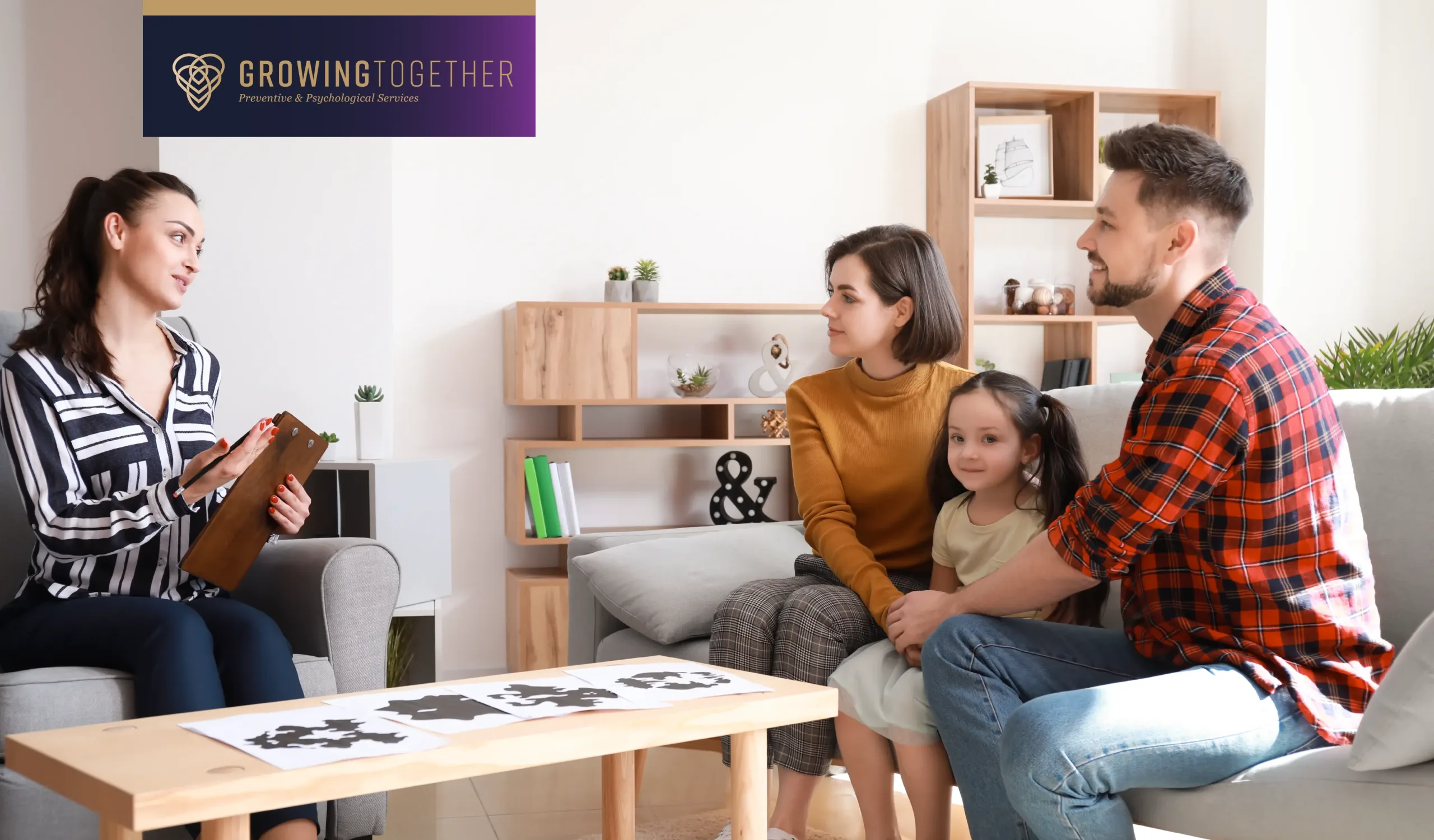 A family therapy session with a psychologist talking to a couple and their young daughter, highlighting open communication and connection in a supportive setting. The Growing Together logo is displayed in the corner.